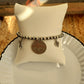 Outlaw charm bracelet