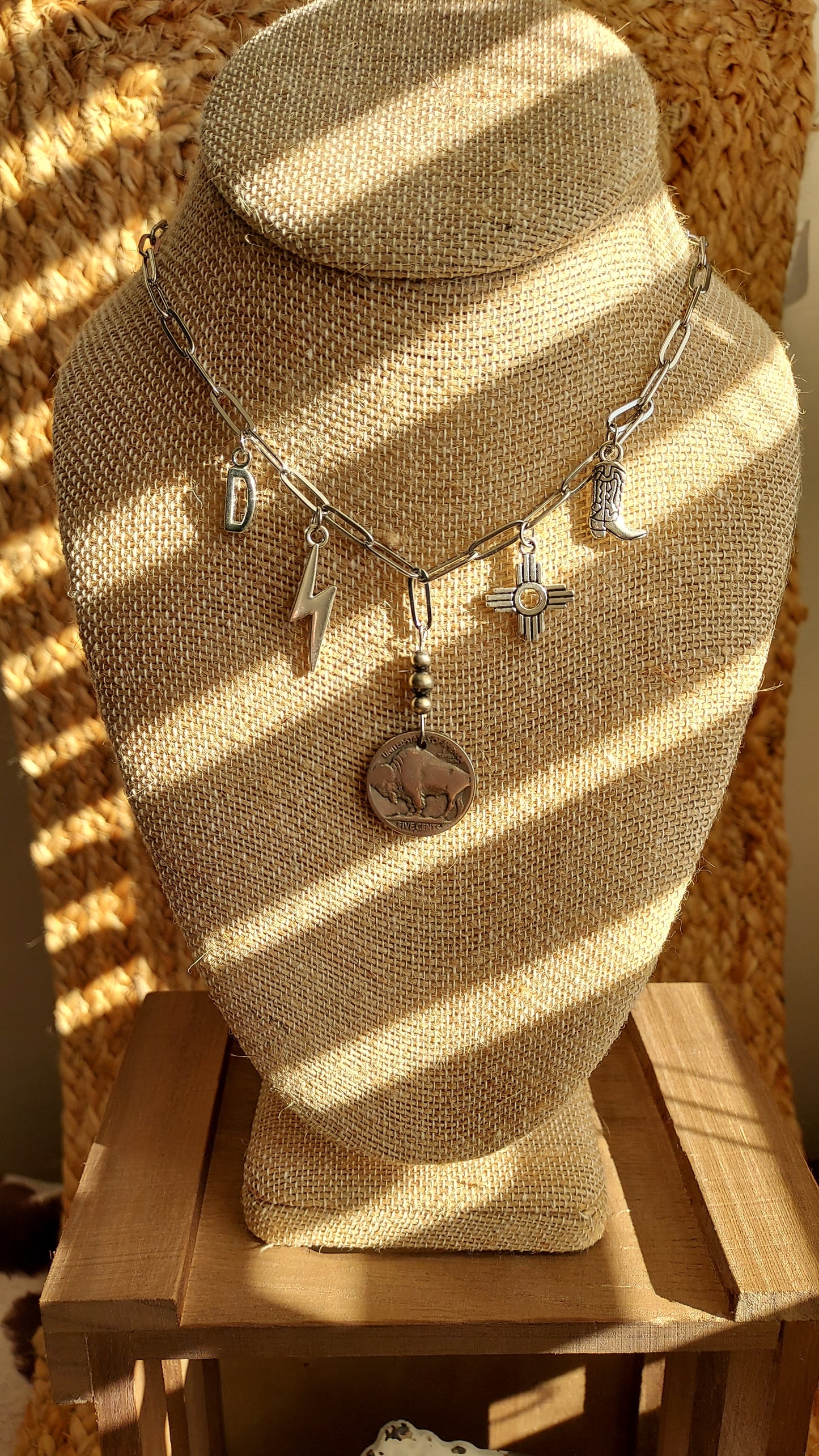 Heading south charm necklace