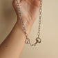 Twisted bit necklace