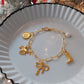 The Golden Cowgirl charm bracelet