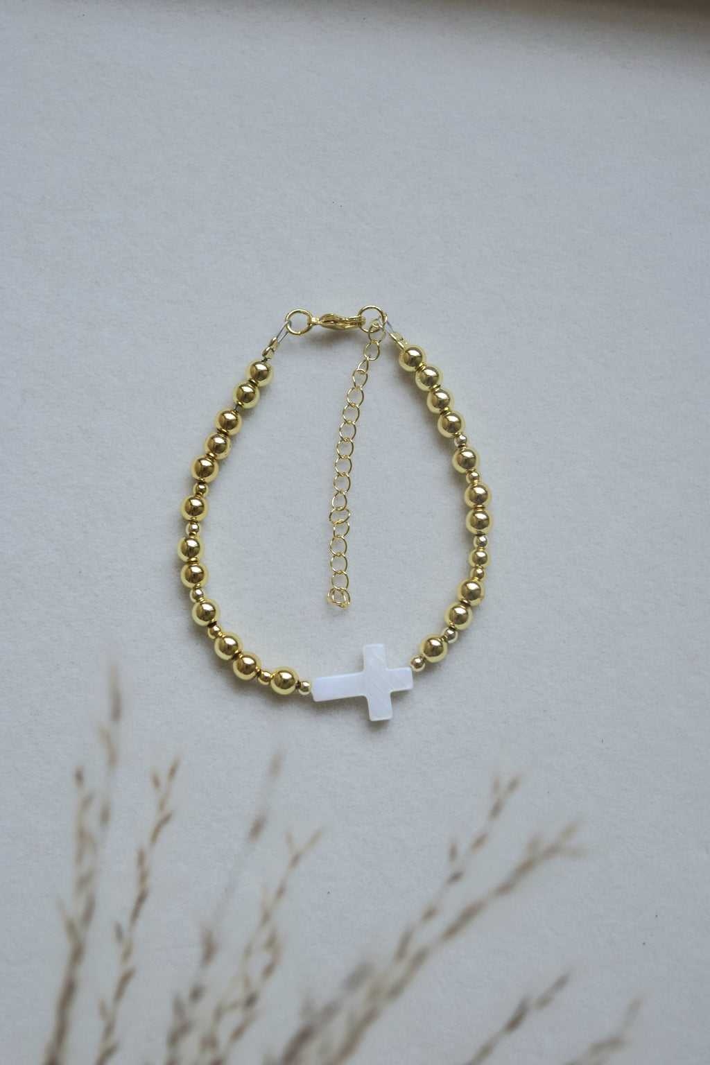 Mother of pearl and gold filled cross bracelet