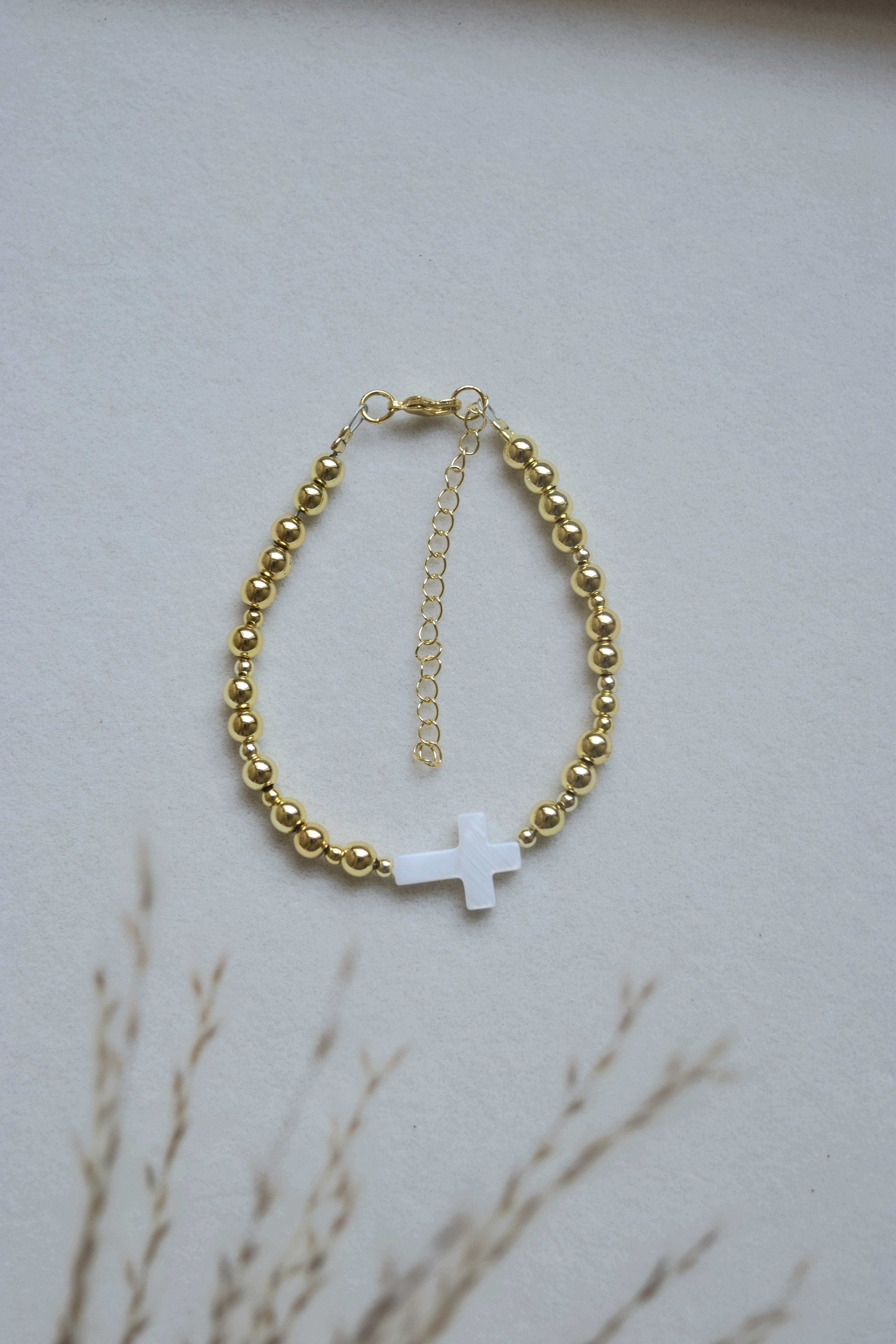 Mother of pearl and gold filled cross bracelet