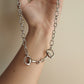 Twisted bit necklace