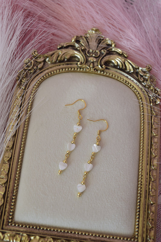 Falling for you dangles in gold