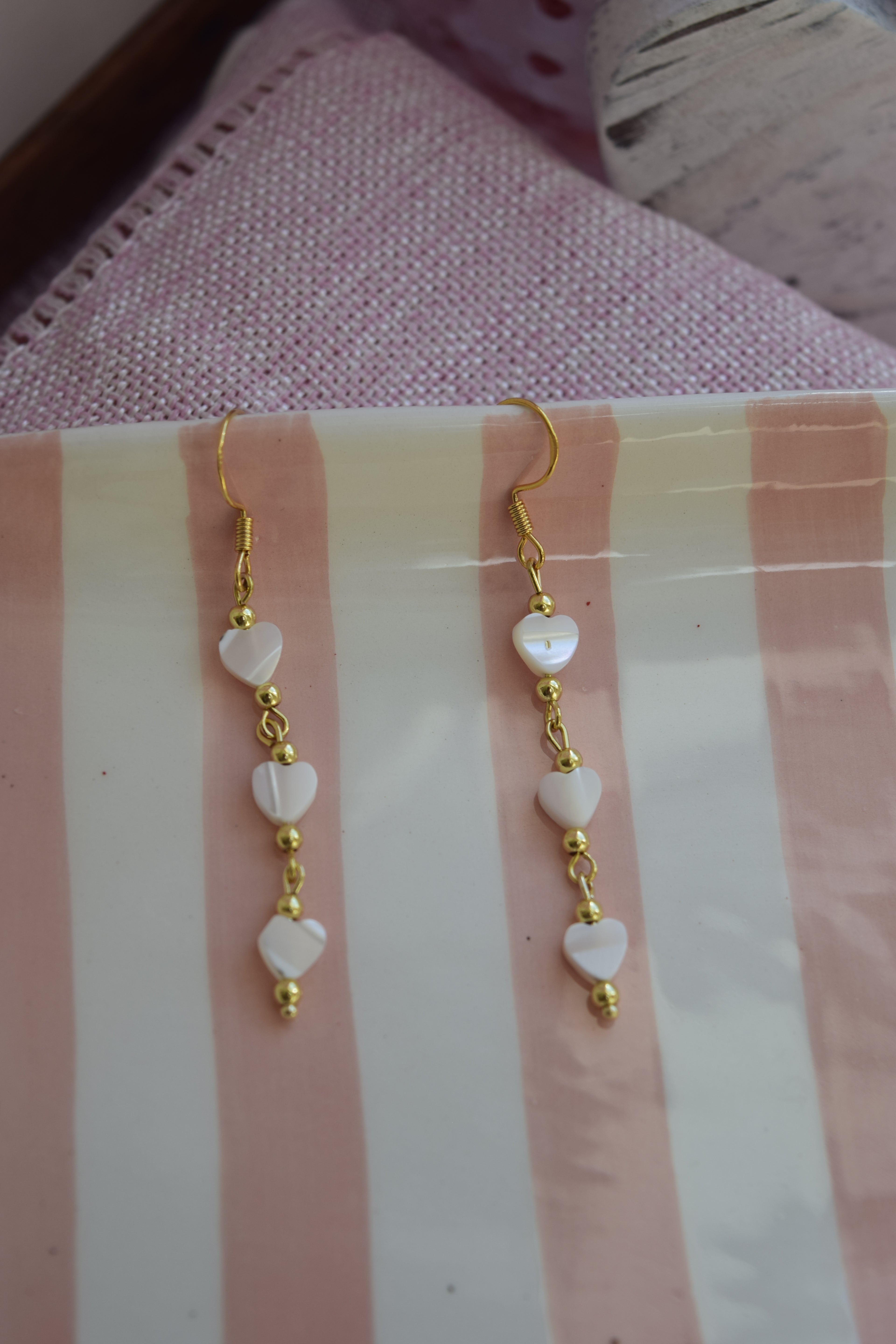 Falling for you dangles in gold