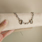 Twisted bit necklace