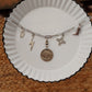 Heading south charm necklace