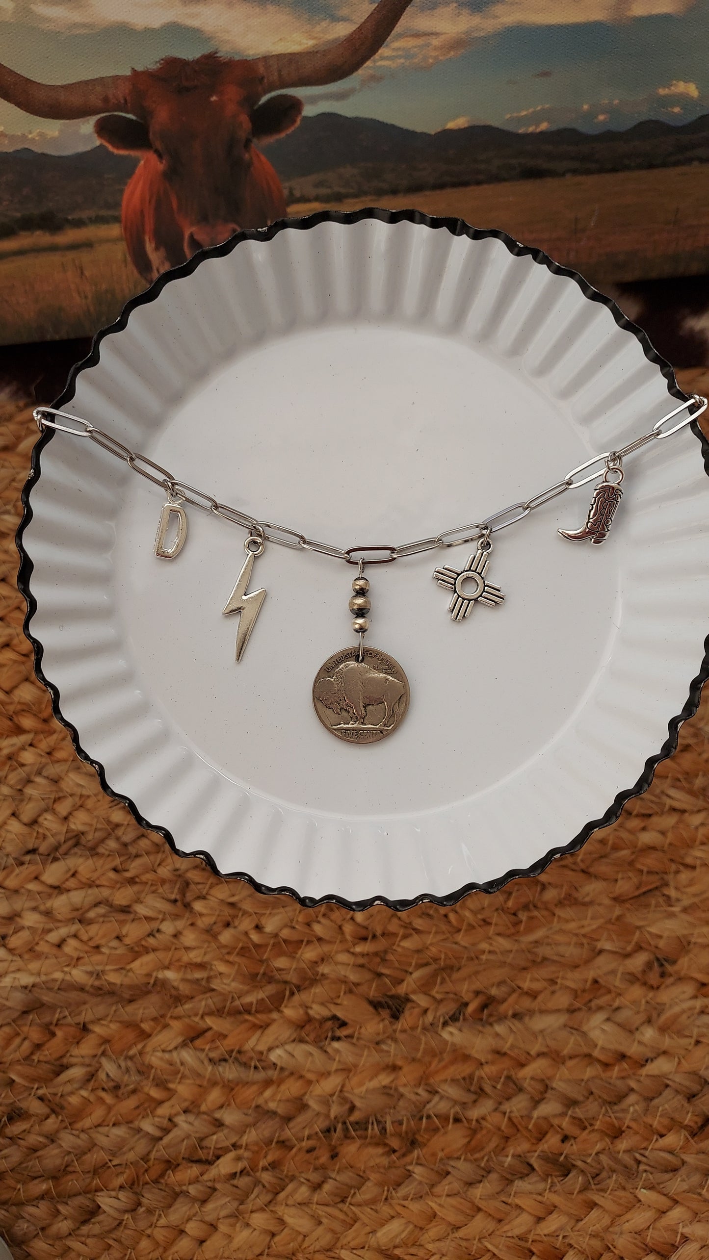 Heading south charm necklace