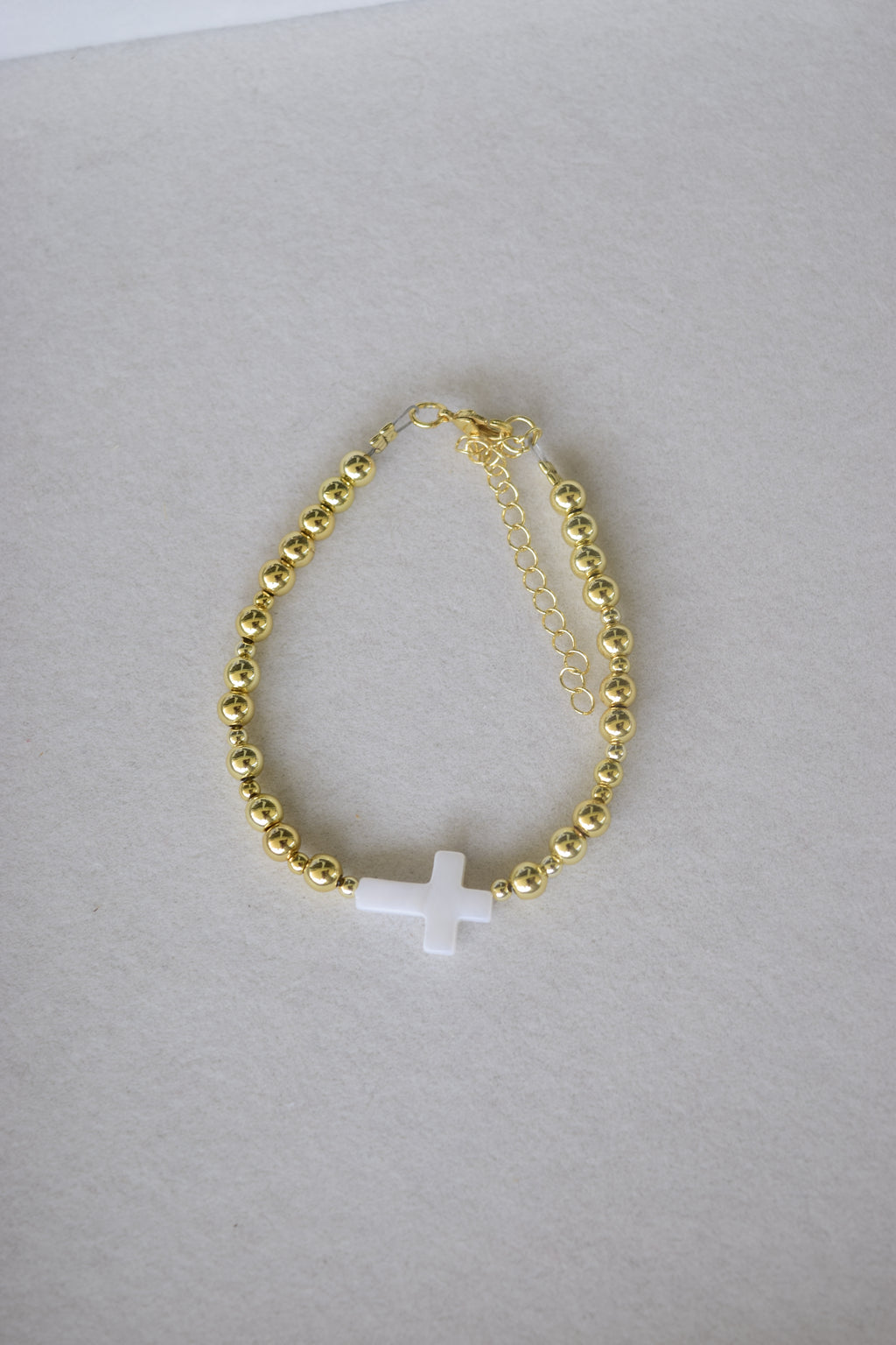 Mother of pearl and gold filled cross bracelet