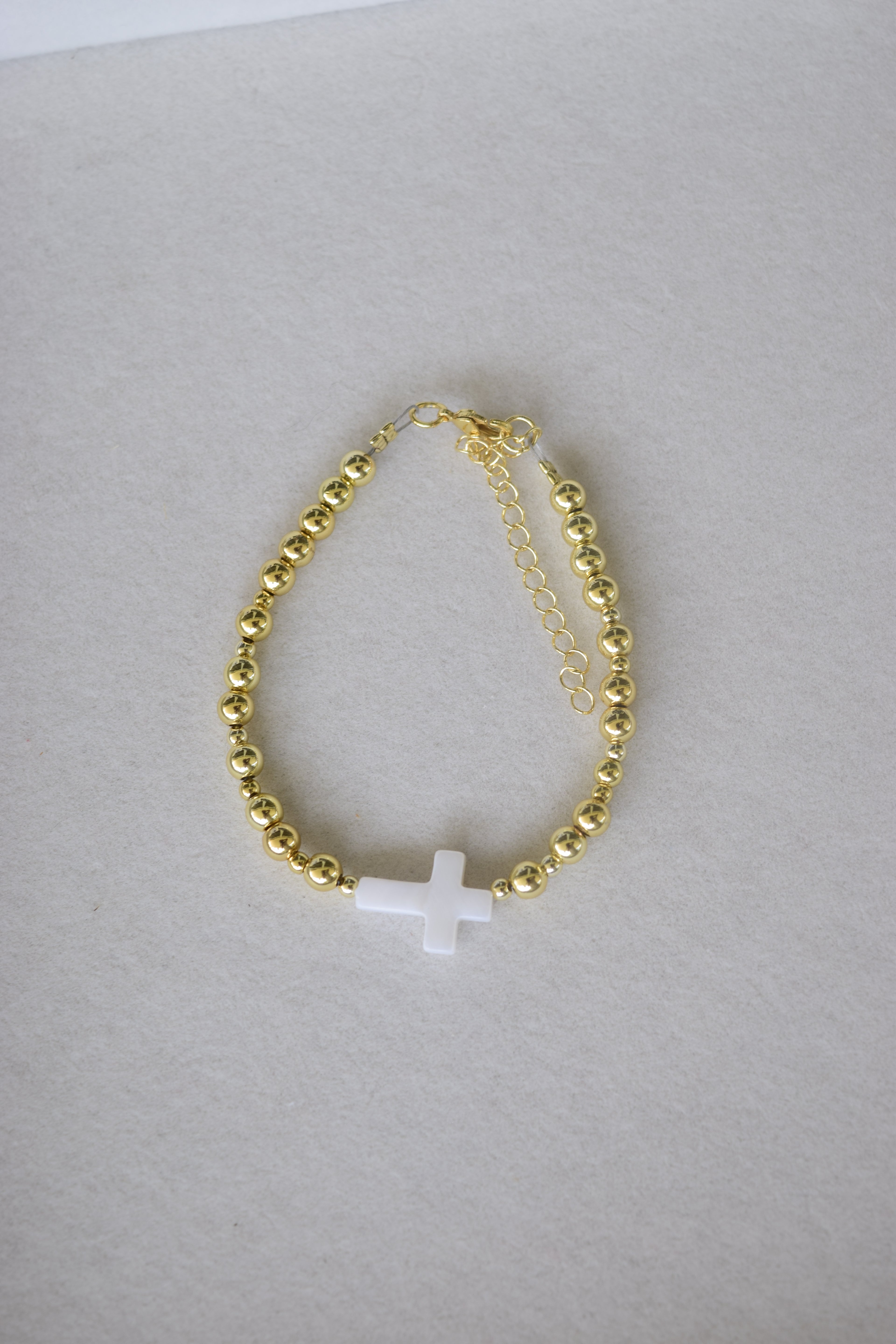 Mother of pearl and gold filled cross bracelet